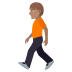 🚶🏽 person walking: medium skin tone display on JoyPixels